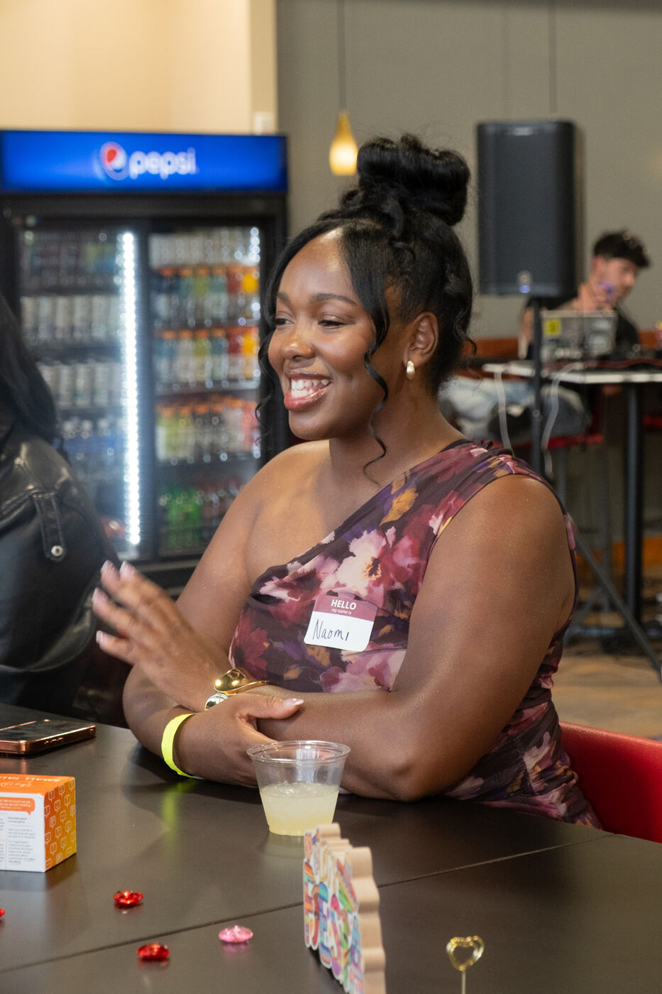Naomi sharing a laugh at a Social Spark mixer